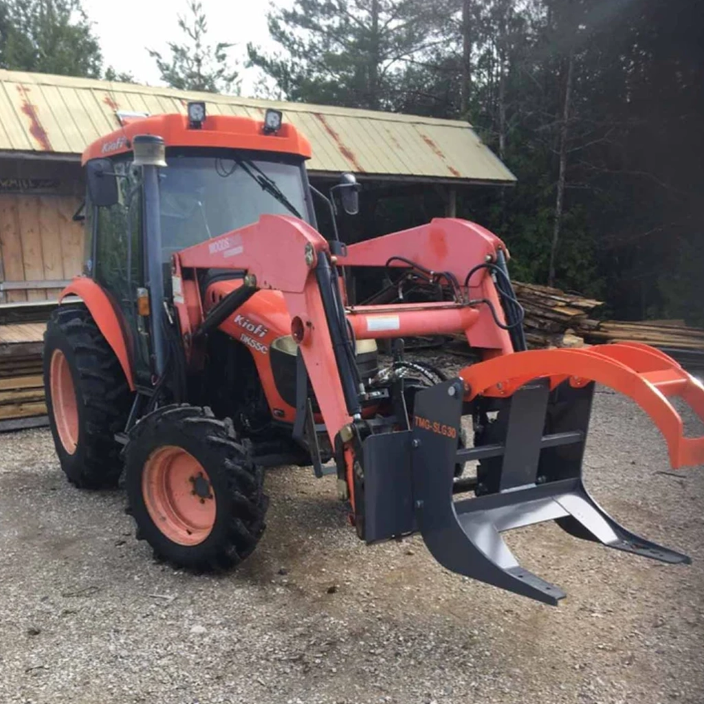 Grappin hydraulique TMG-SLG30 monté sur tracteur agricole